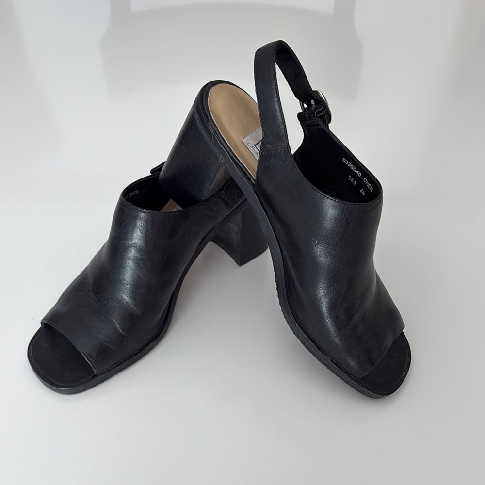 Black Leather Mules with Open Toe Design